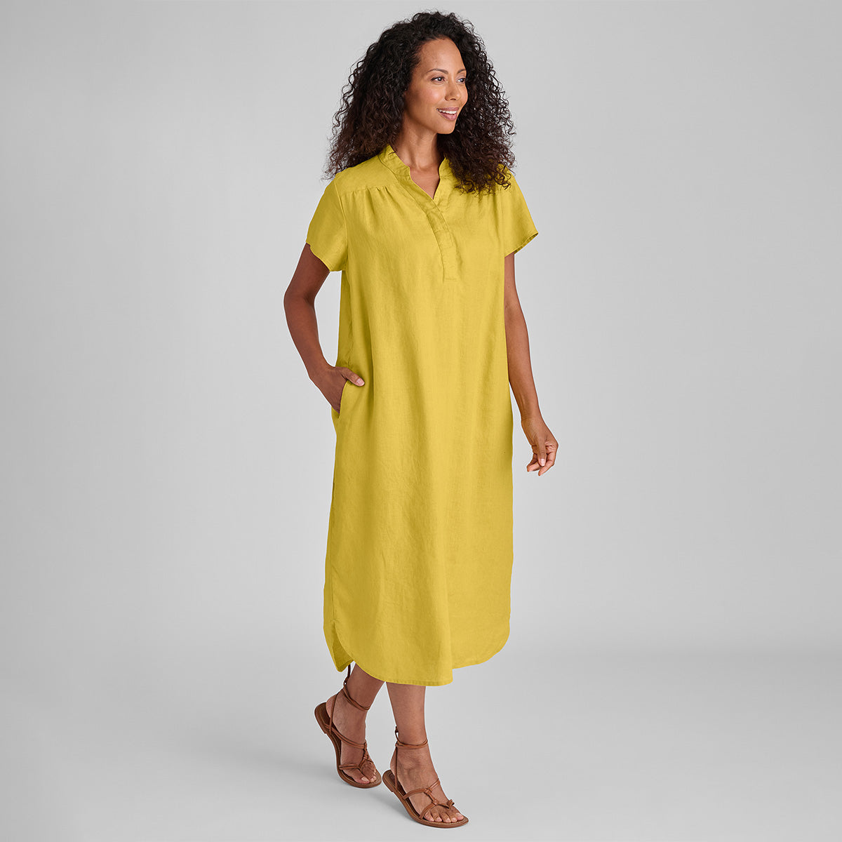 woman wearing linen maxi dress in yellow