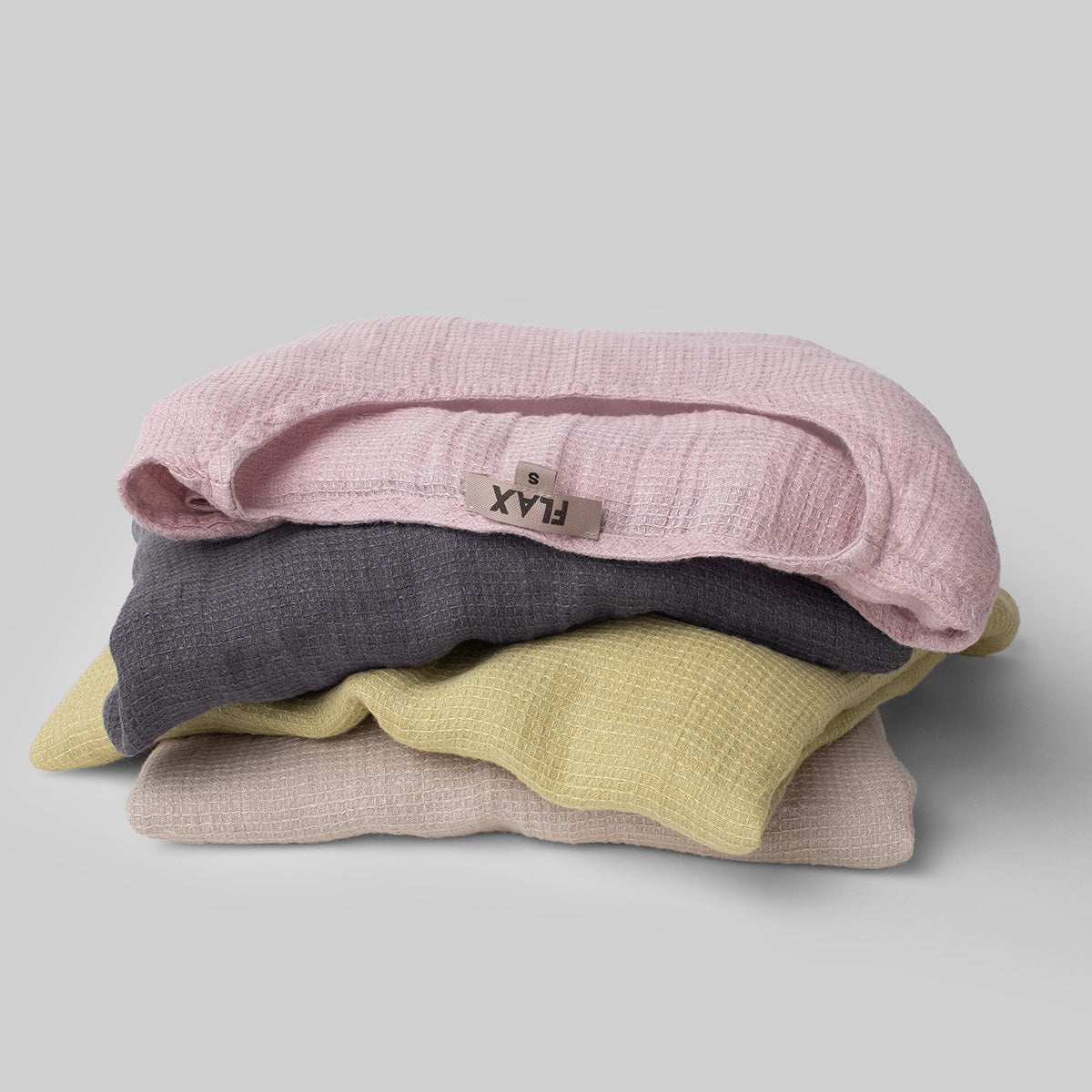 stack of FLAX linen shirts