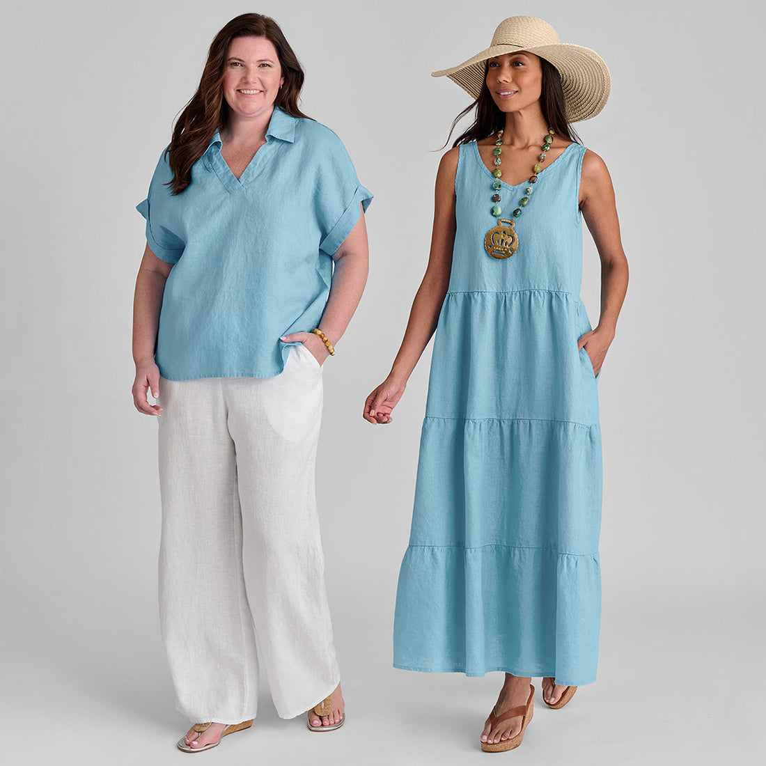 two women wearing blue and white linen outfits