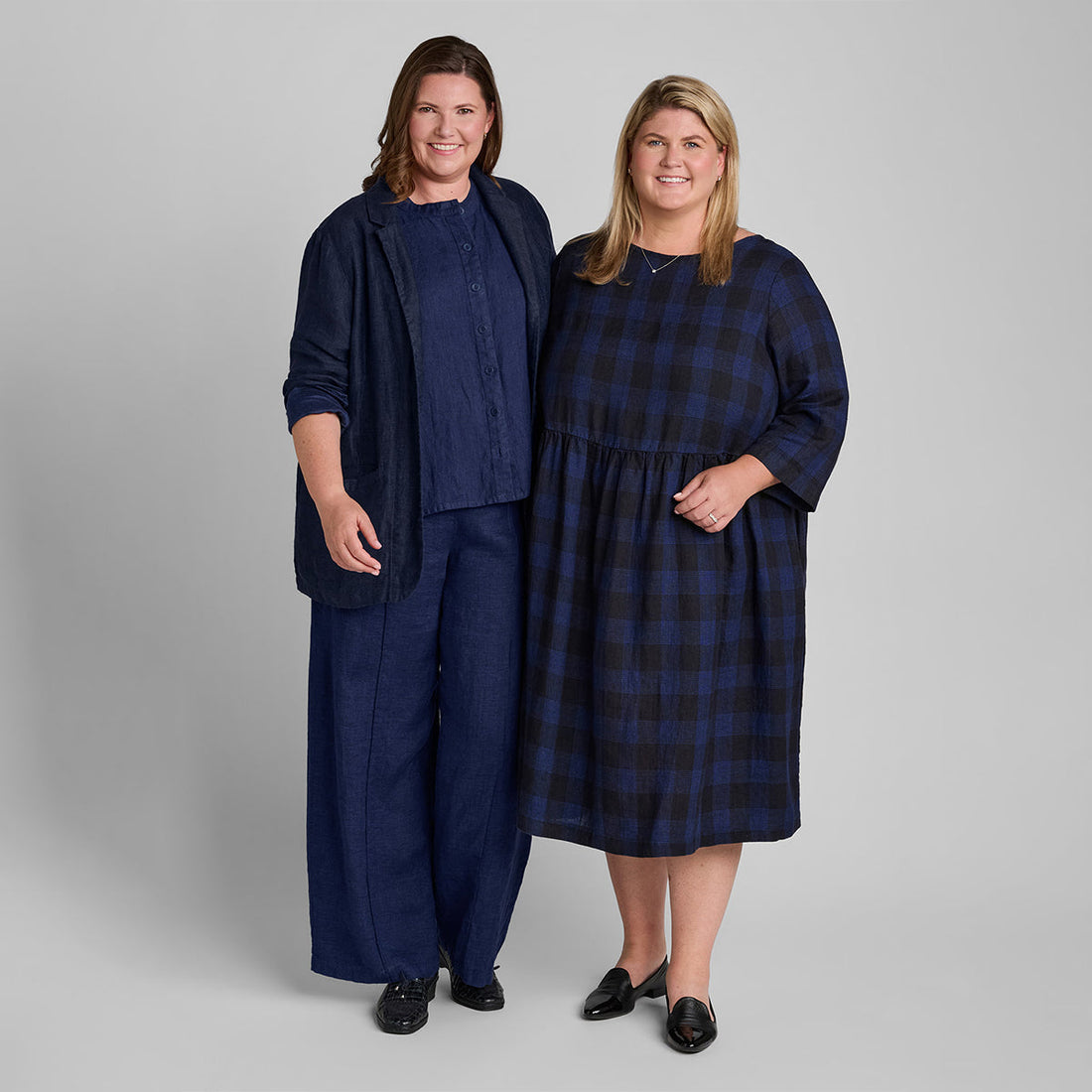 two women side by side wearing linen clothing