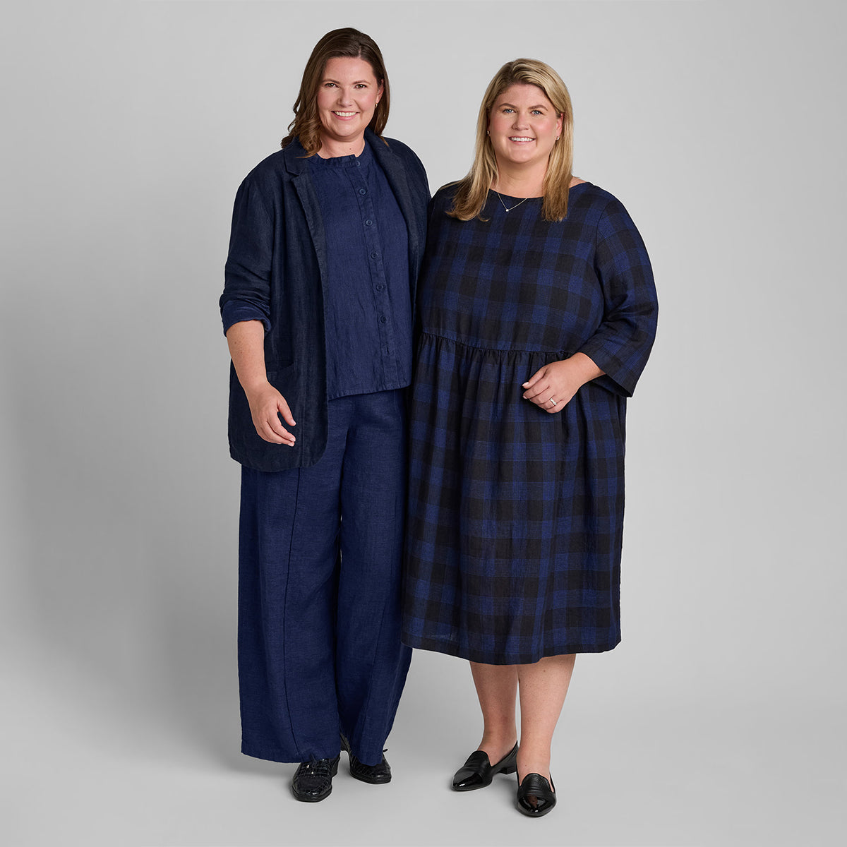 two women side by side wearing linen clothing