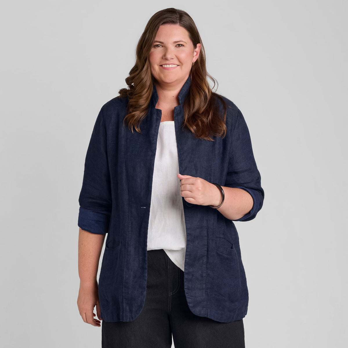 Woman in blue linen blazer