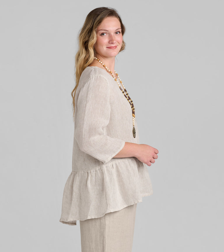 Woman in tan FLAX women's linen clothing brand tunic