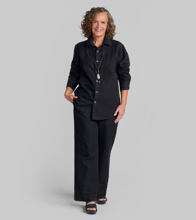 Woman in linen/cotton blend black denim outfit
