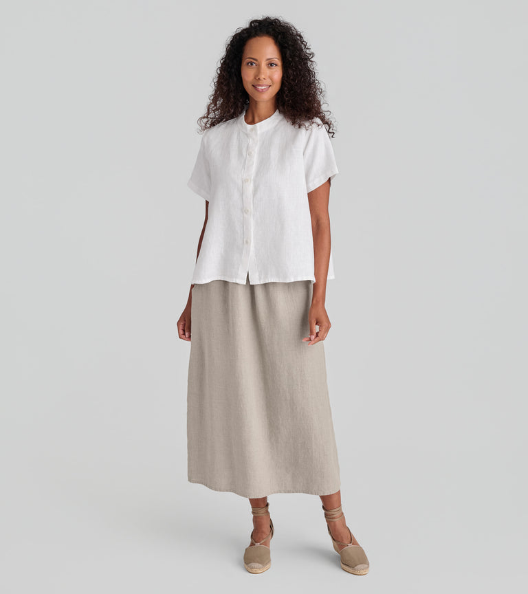 Woman in FLAX linen top in white and skirt in natural