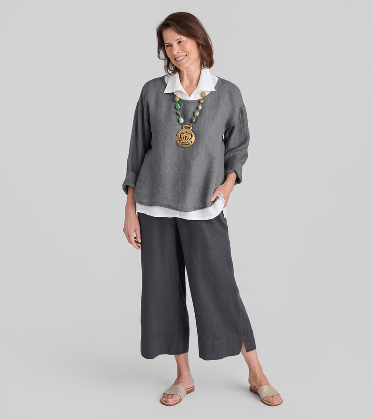 Woman in FLAX linen top in gray and pants in gray