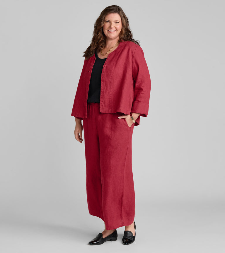 Woman in red and black linen outfit wearing Flax clothing brand