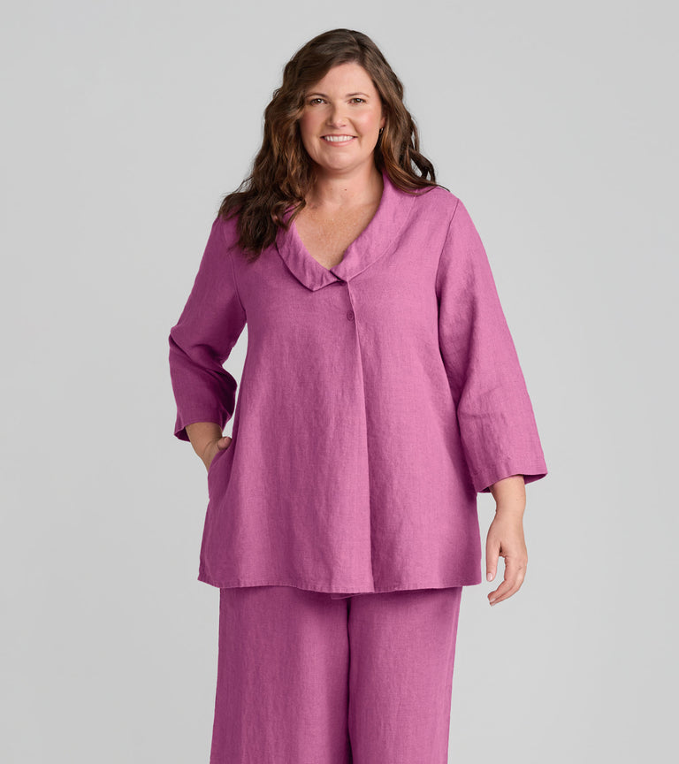Woman in FLAX clothing brand pink linen top