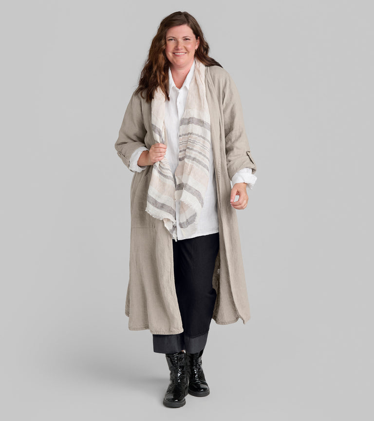 Woman in FLAX linen tan trench coat