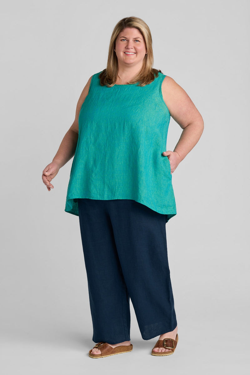 Woman in blue linen tank top and blue linen pants