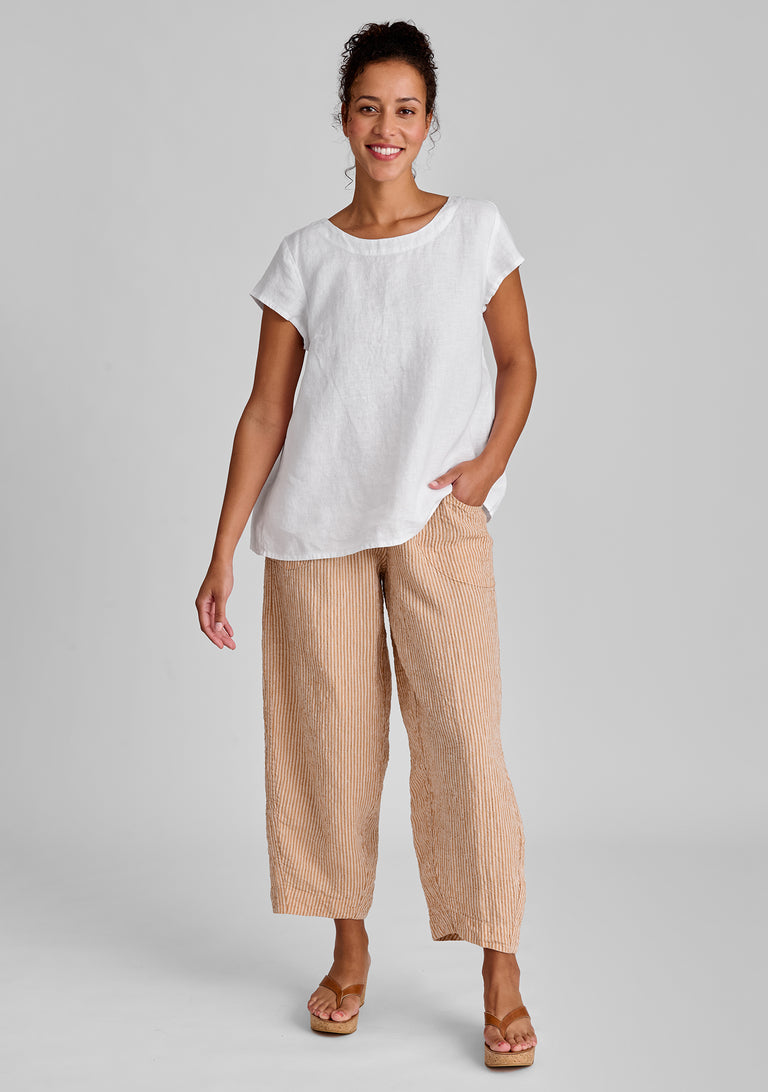 FLAX linen tee in white with linen pants in orange