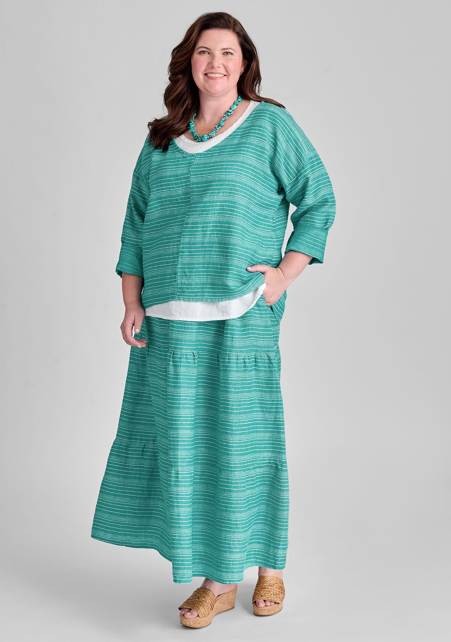 FLAX linen shirt in green with linen tank in white and linen skirt in green
