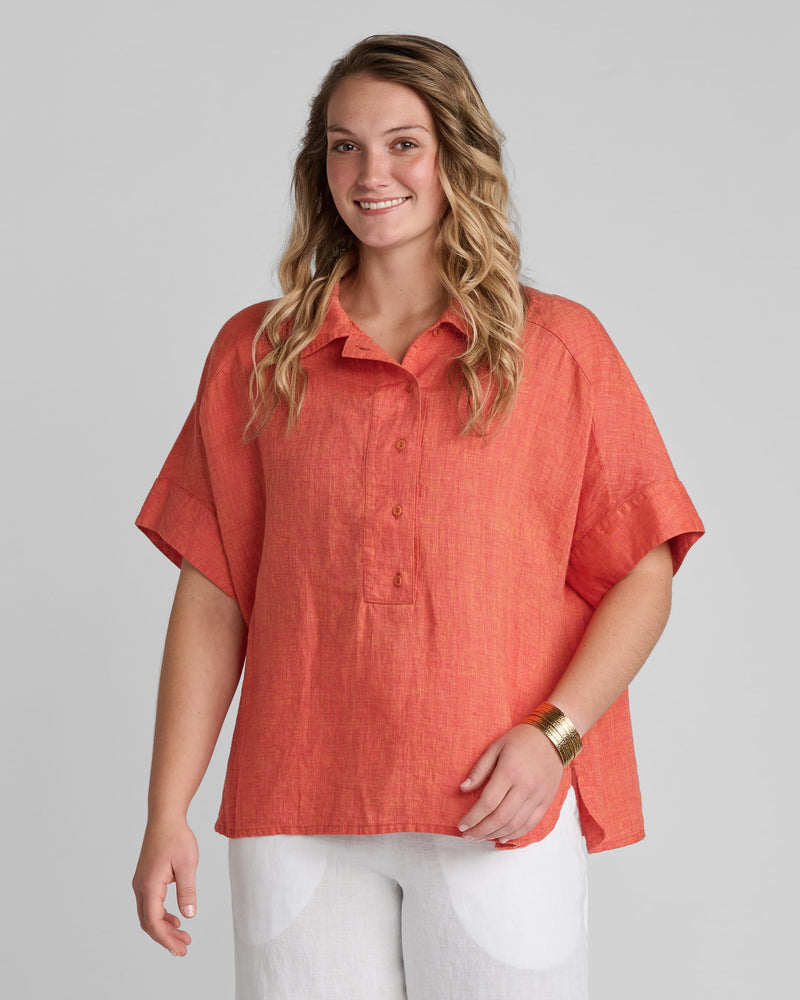Woman in Flax linen clothing brand orange linen shirt