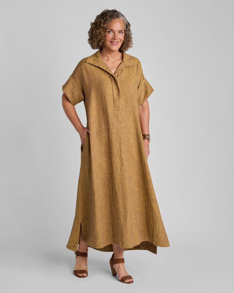 Woman in short sleeve brown linen shirtdress