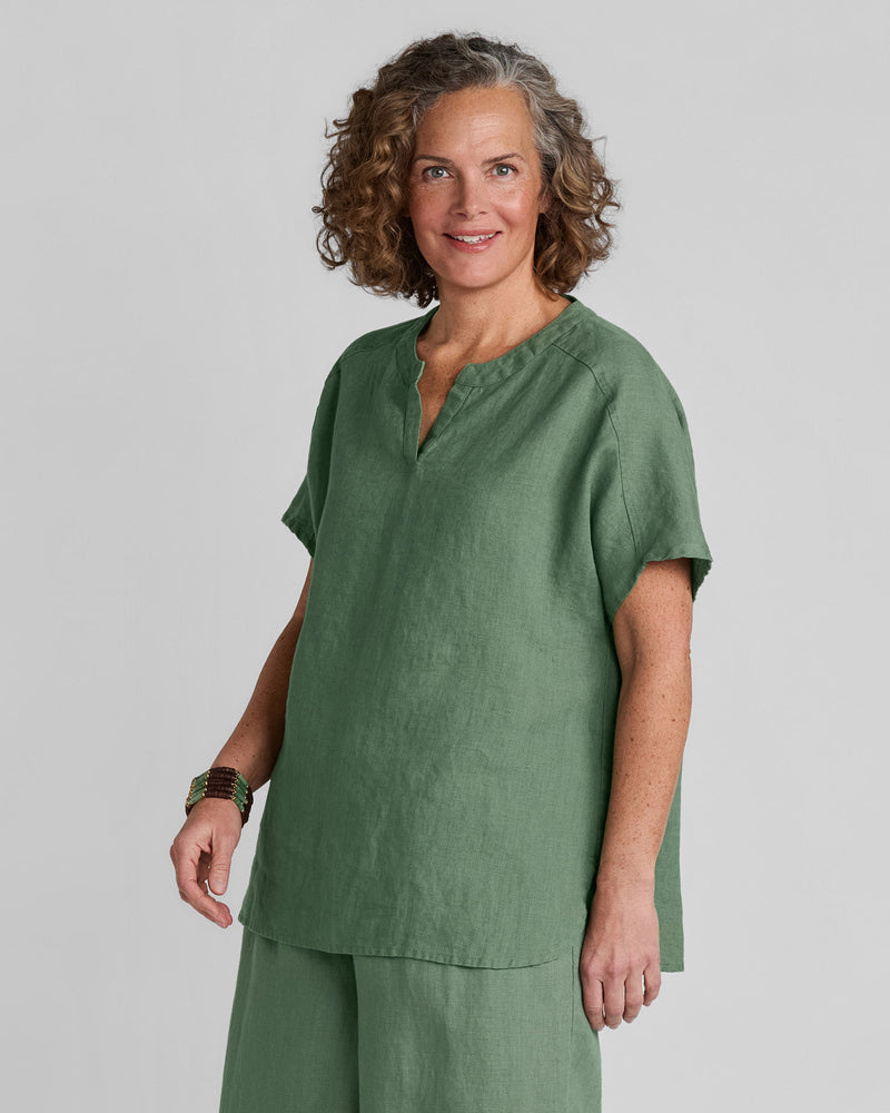 Woman in Flax linen clothing brand green linen tee shirt