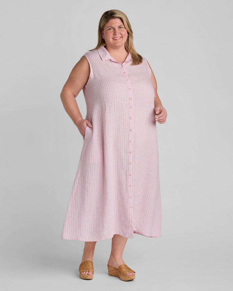 Woman in pink linen shirtdress