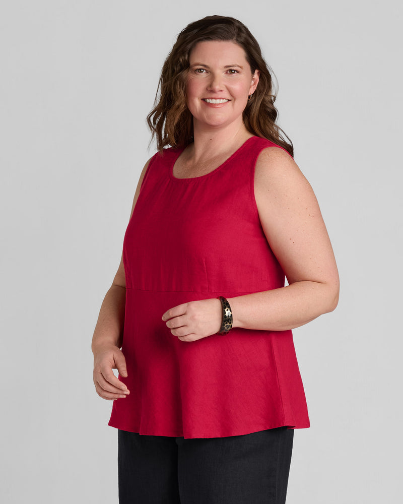 Woman in red linen tank top