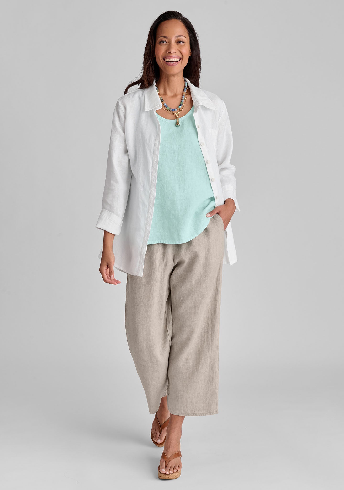 FLAX linen shirt in white with linen tank in green and linen pants in natural