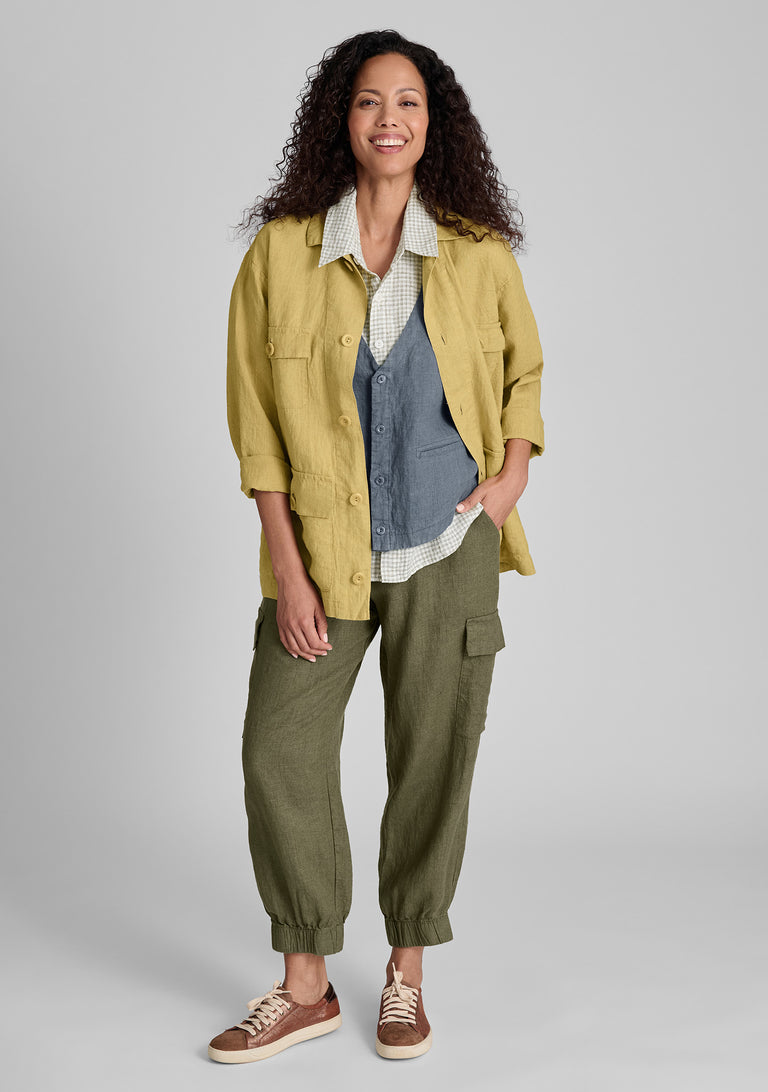FLAX linen jacket in yellow with linen vest in blue and linen shirt in green with linen pants in green