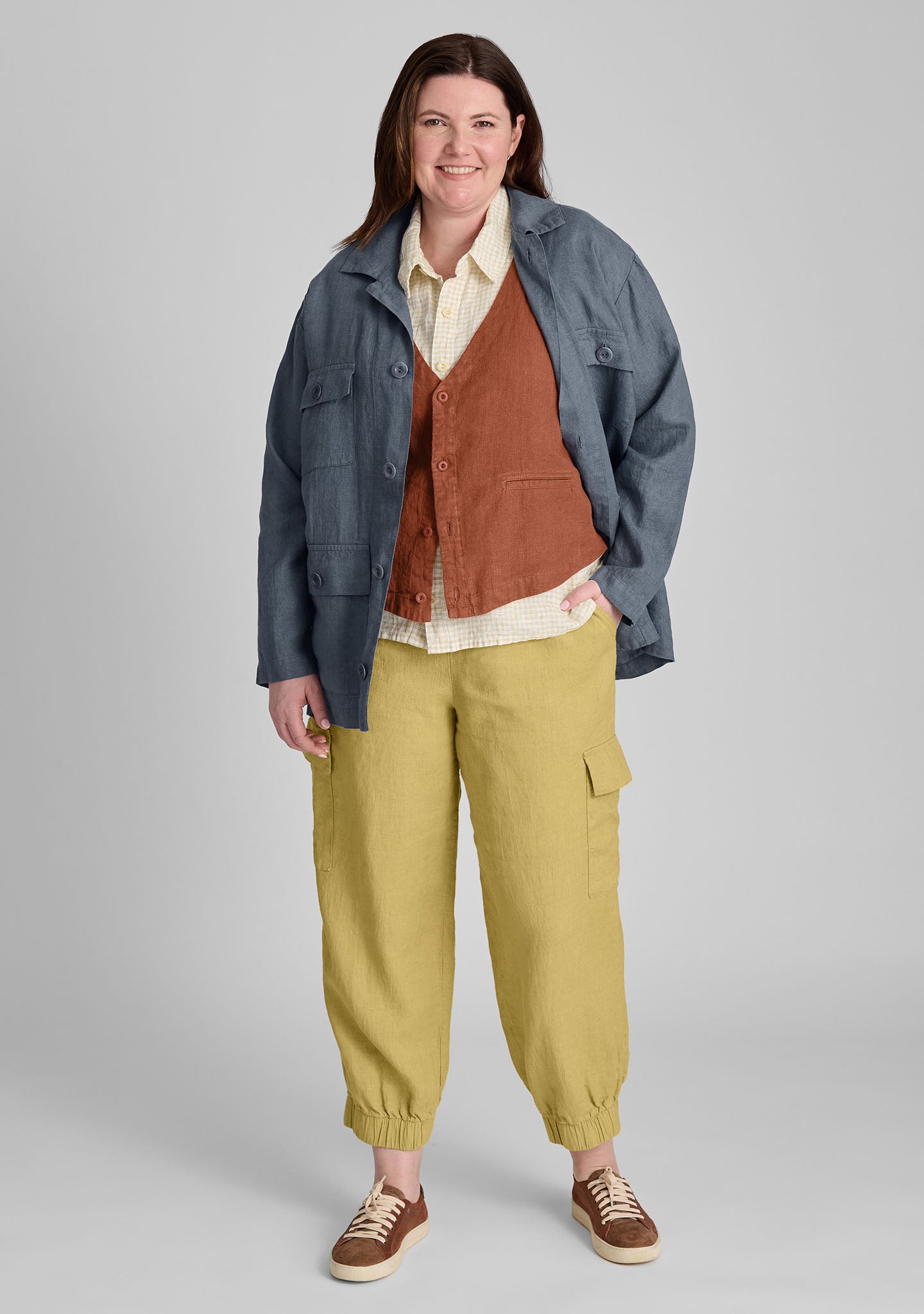 FLAX jacket in blue with linen vest in red and linen shirt in yellow and linen pants in yellow
