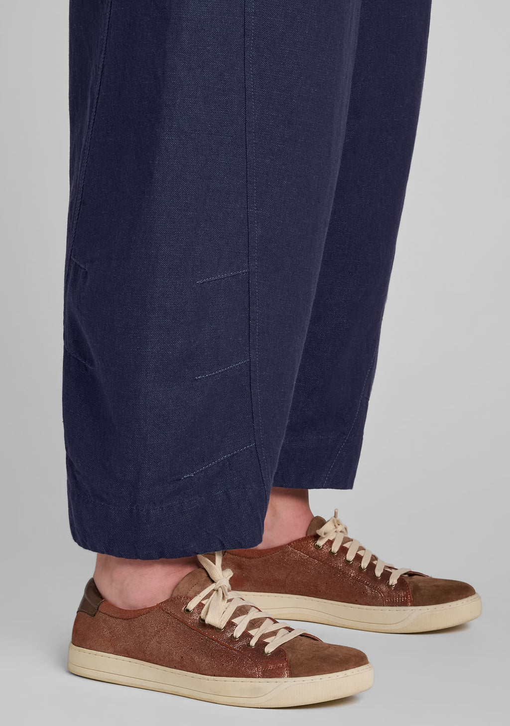 close up of seaming details on the leg of barrel pants
