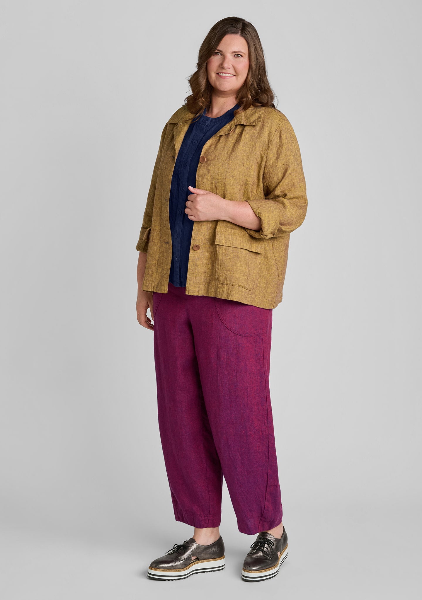 FLAX linen jacket in brown with linen blouse in blue and linen pants in red