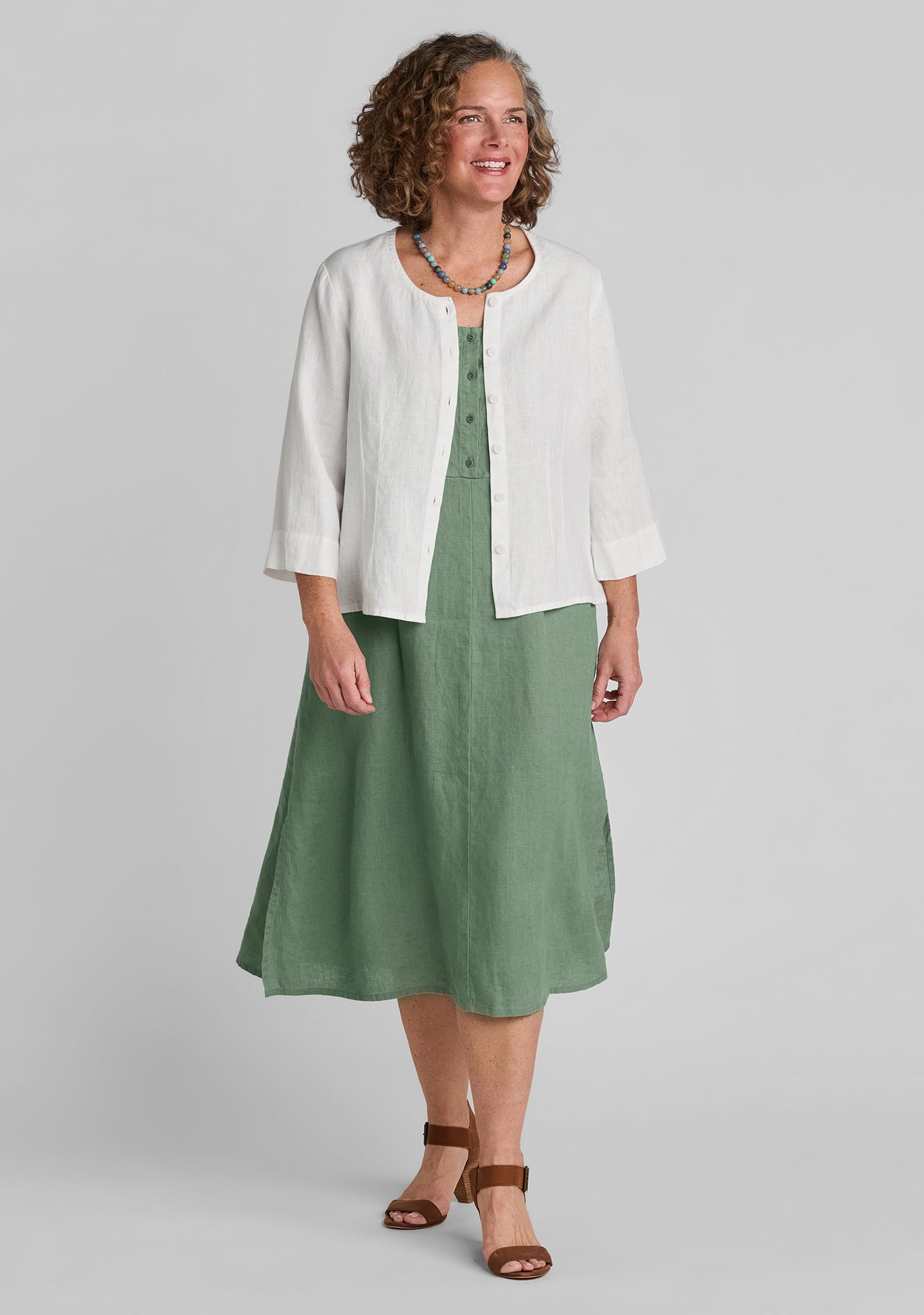linen blouse in white with linen dress in green