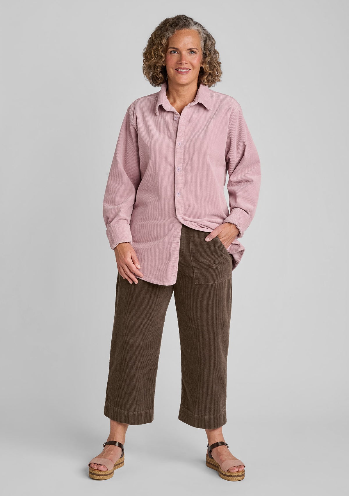 cotton blend corduroy shirt in pink with corduroy cropped pants in brown