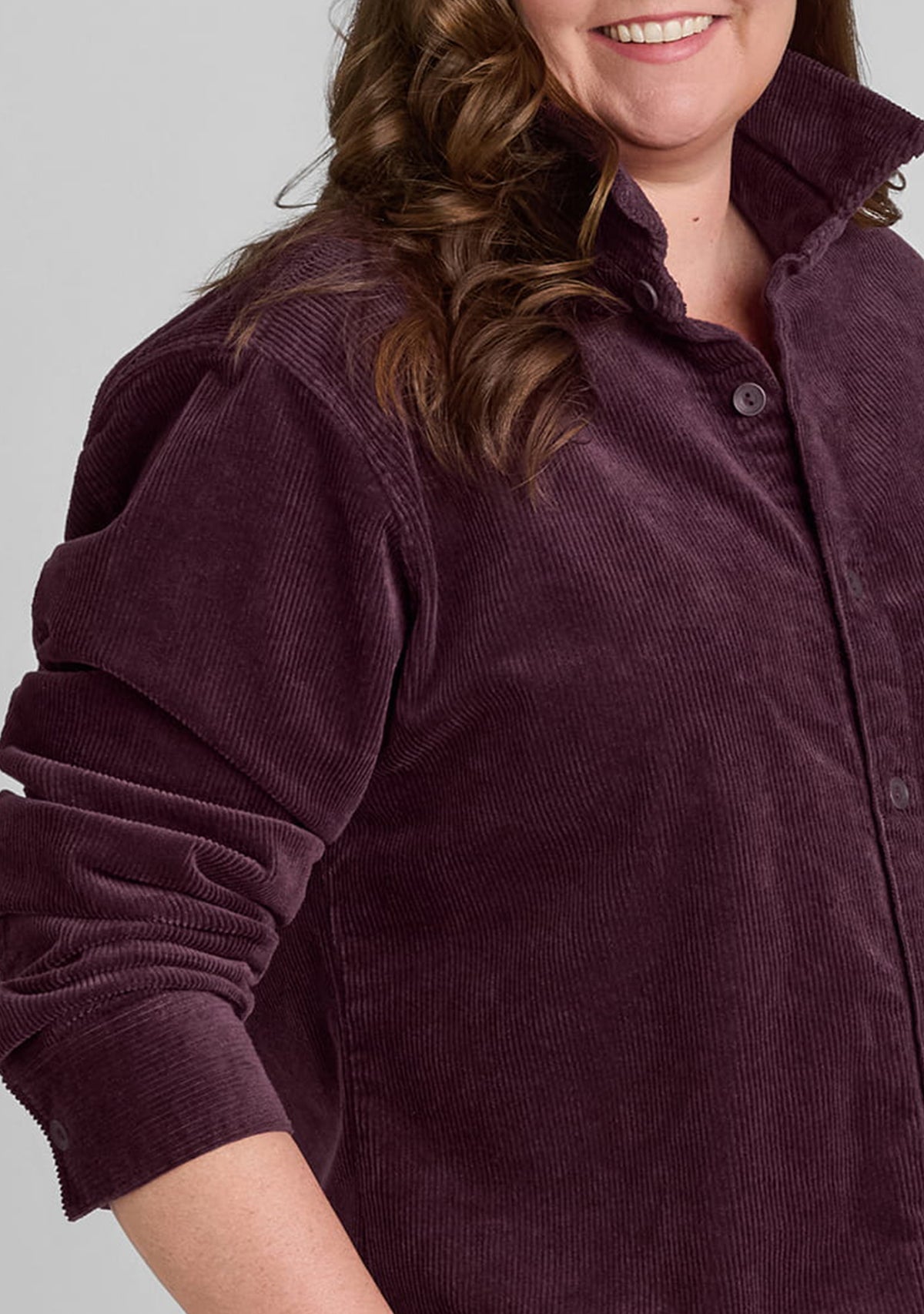 close up of corduroy fabric in purple