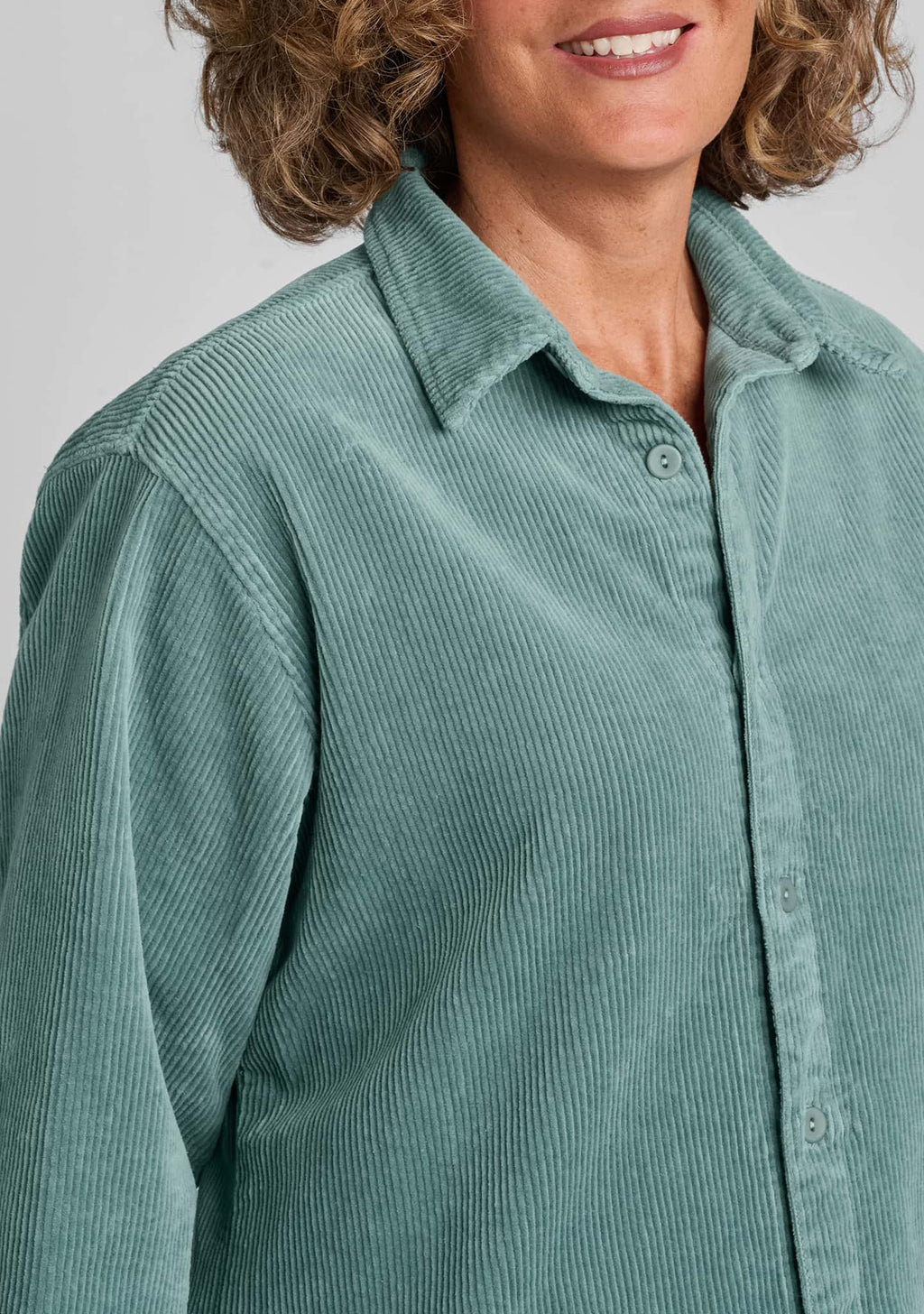 close up of corduroy fabric in blue