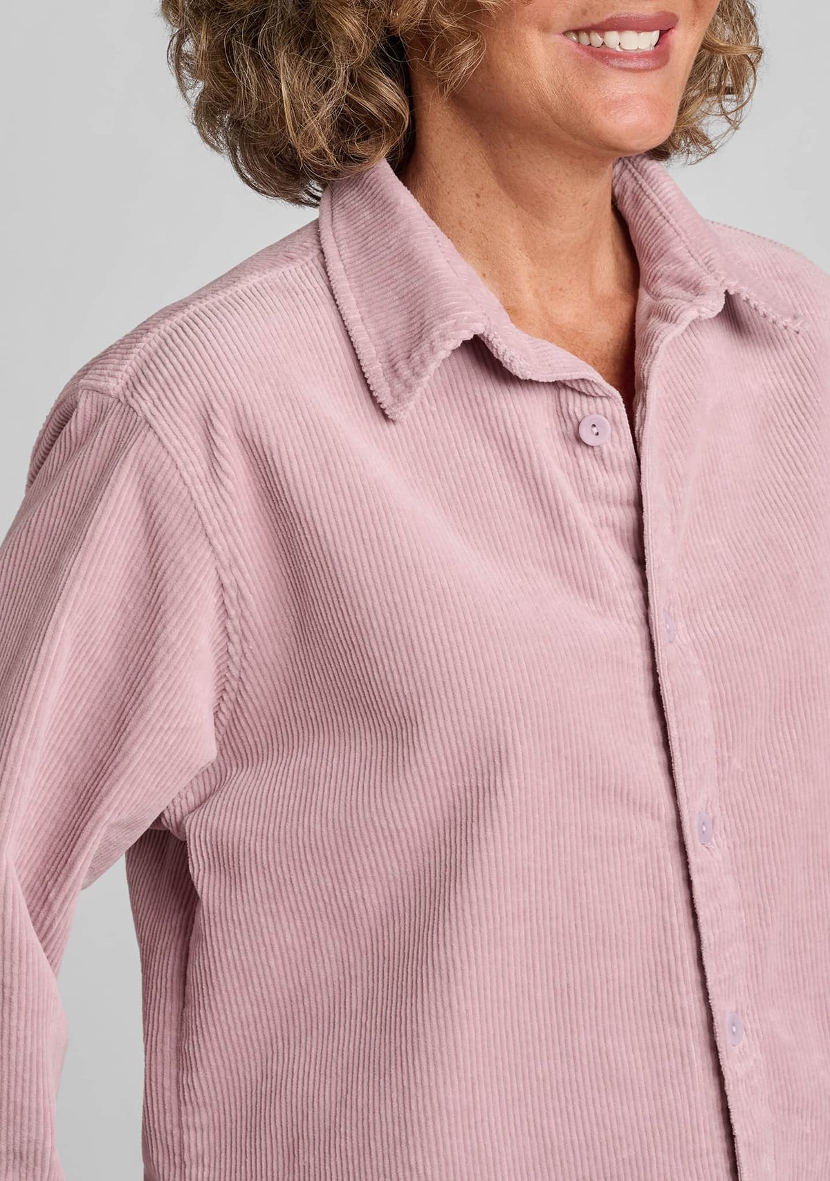 close up of corduroy fabric in pink