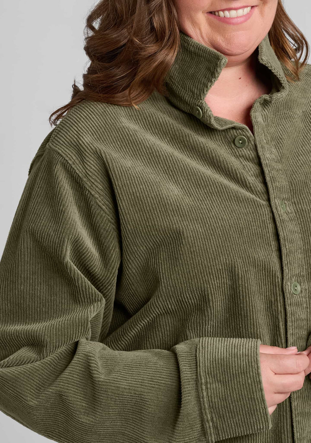 close up of corduroy fabric in green
