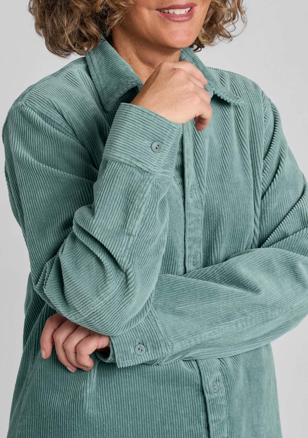 close up details of cuff on corduroy shirt