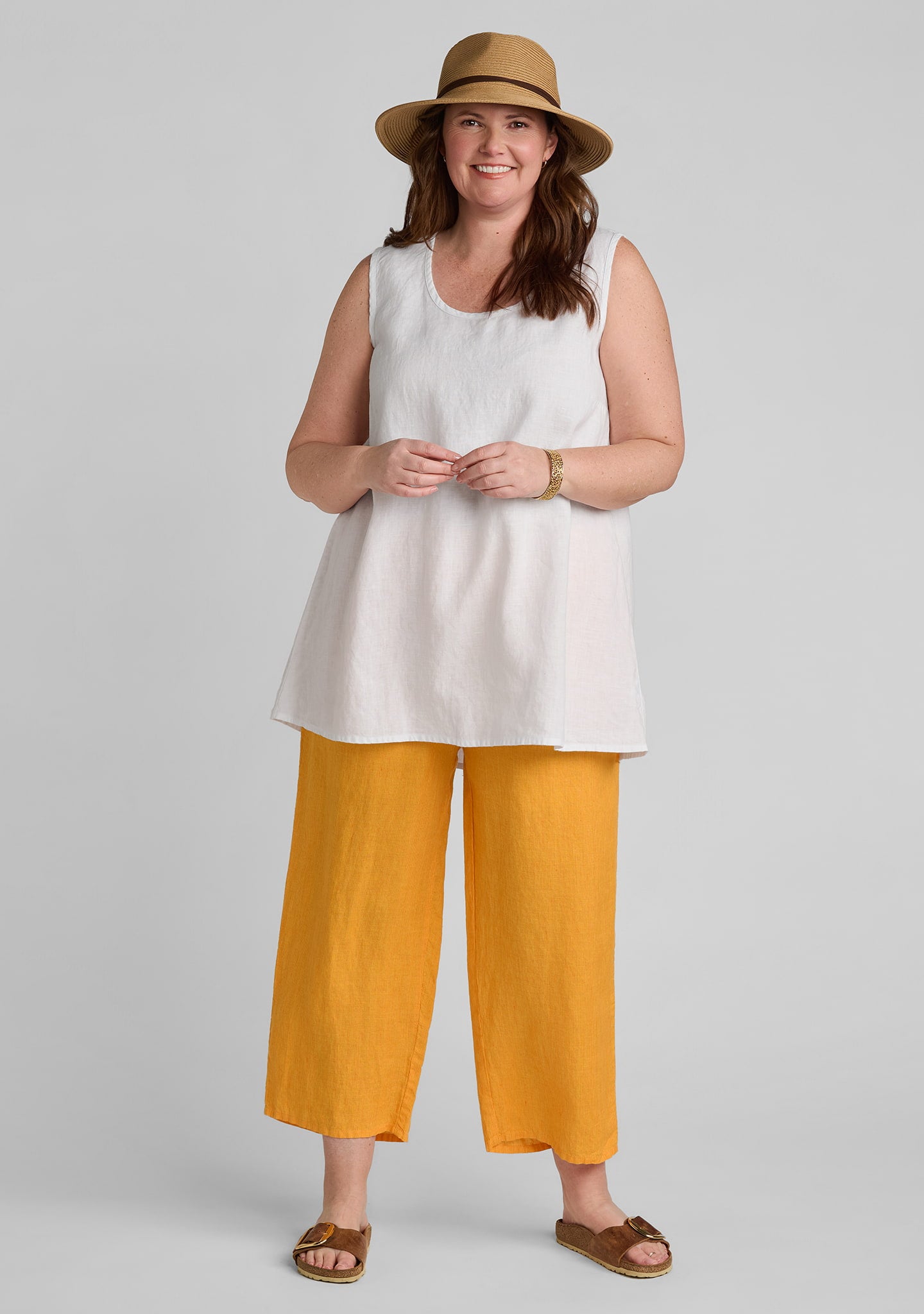 FLAX linen tank top in white with linen pants in orange