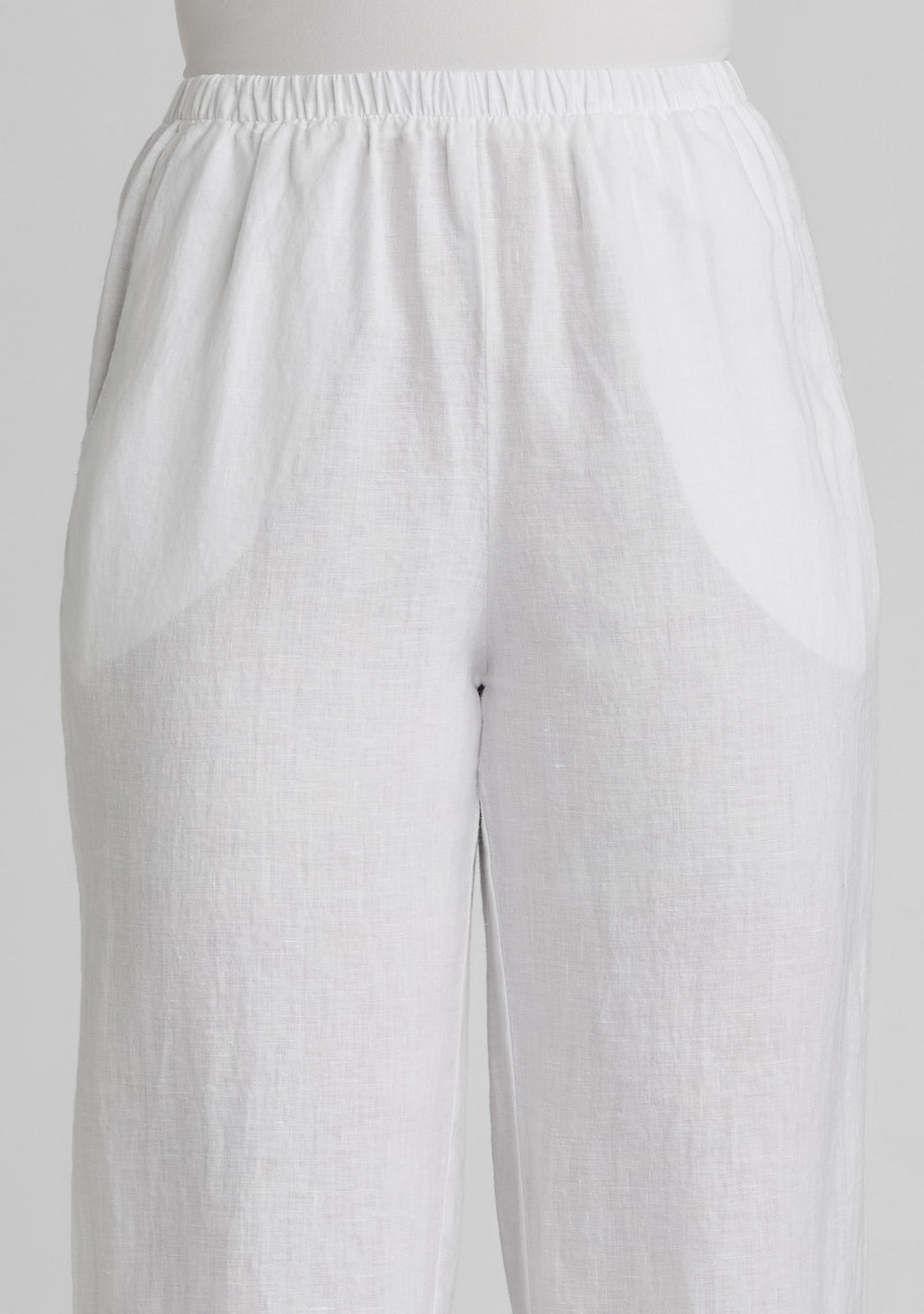 close up view of waistband on women's white linen pants