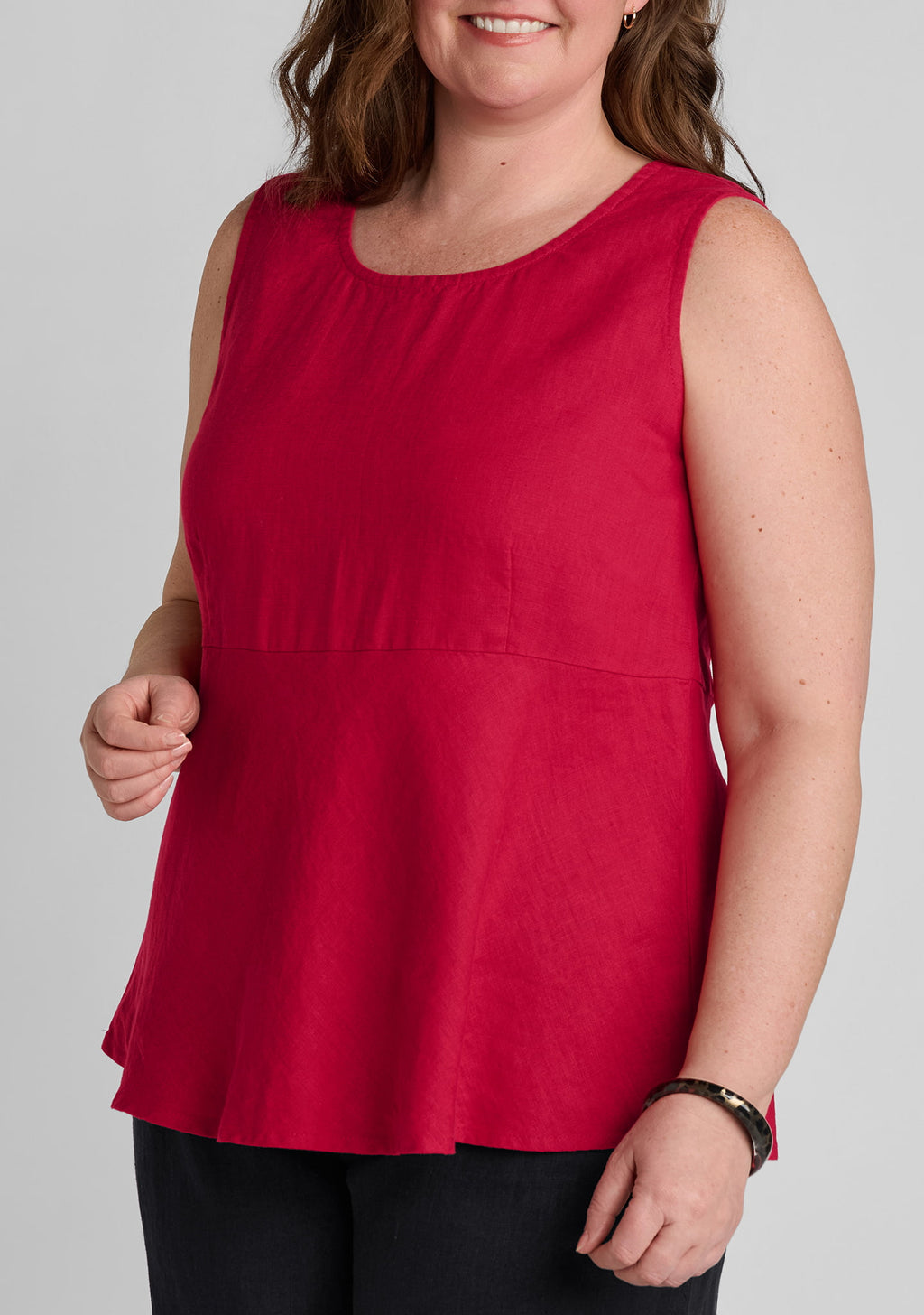 seam details and drape of women's linen tank top in red