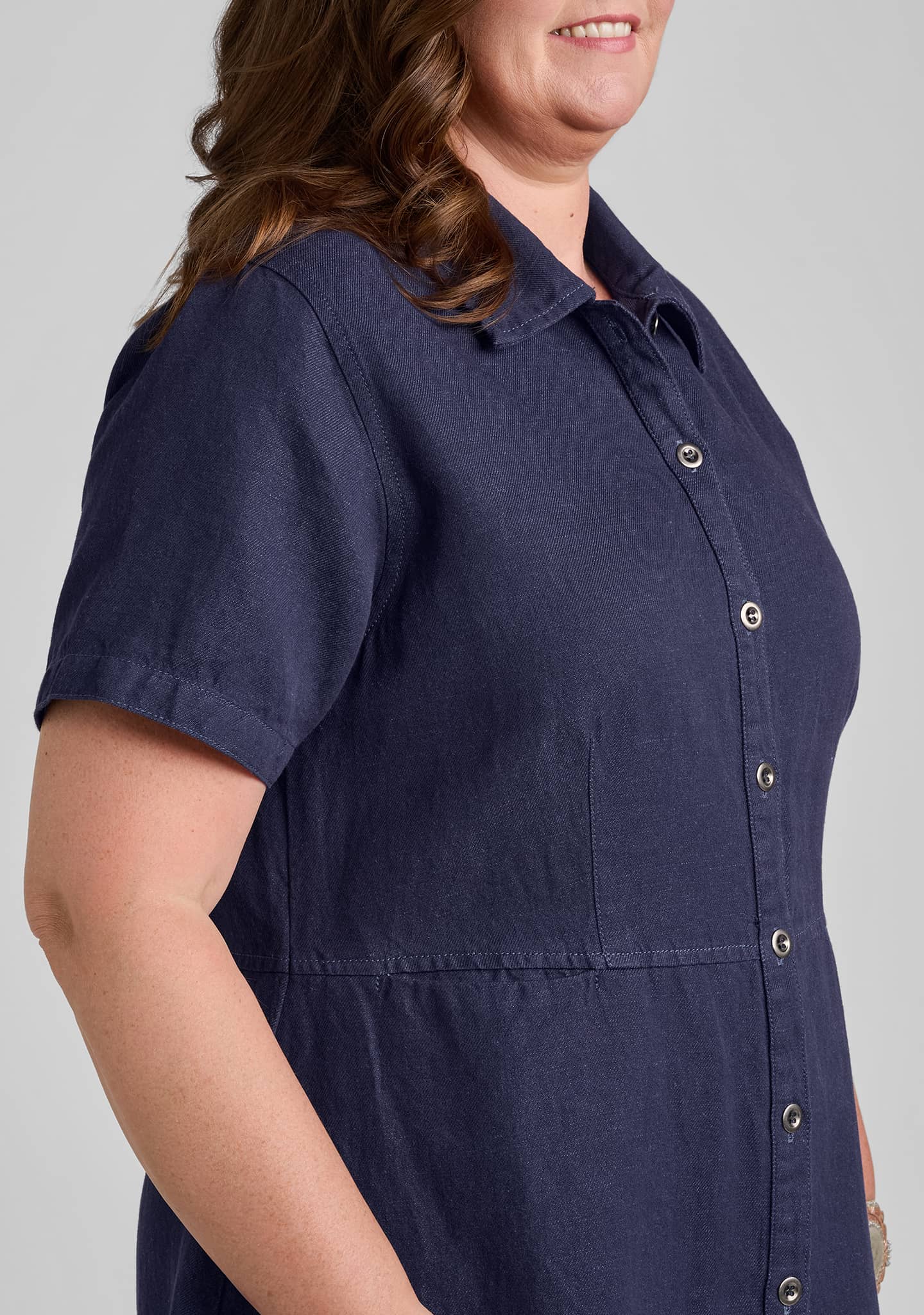 side view of details and sleeve on denim dress