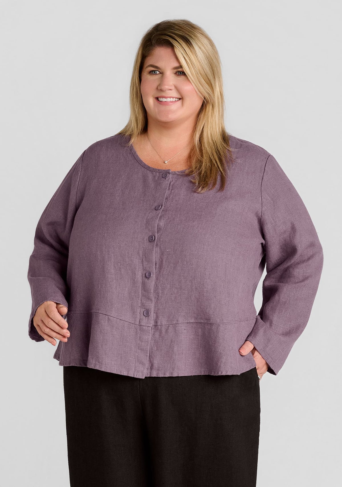 linen cardigan in purple worn on a plus size model