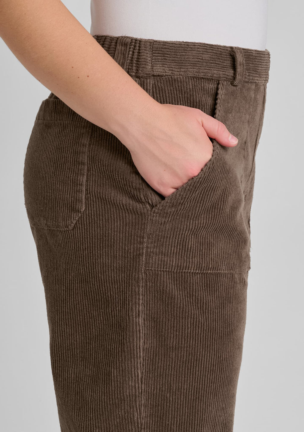 close up detail with hand in pocket