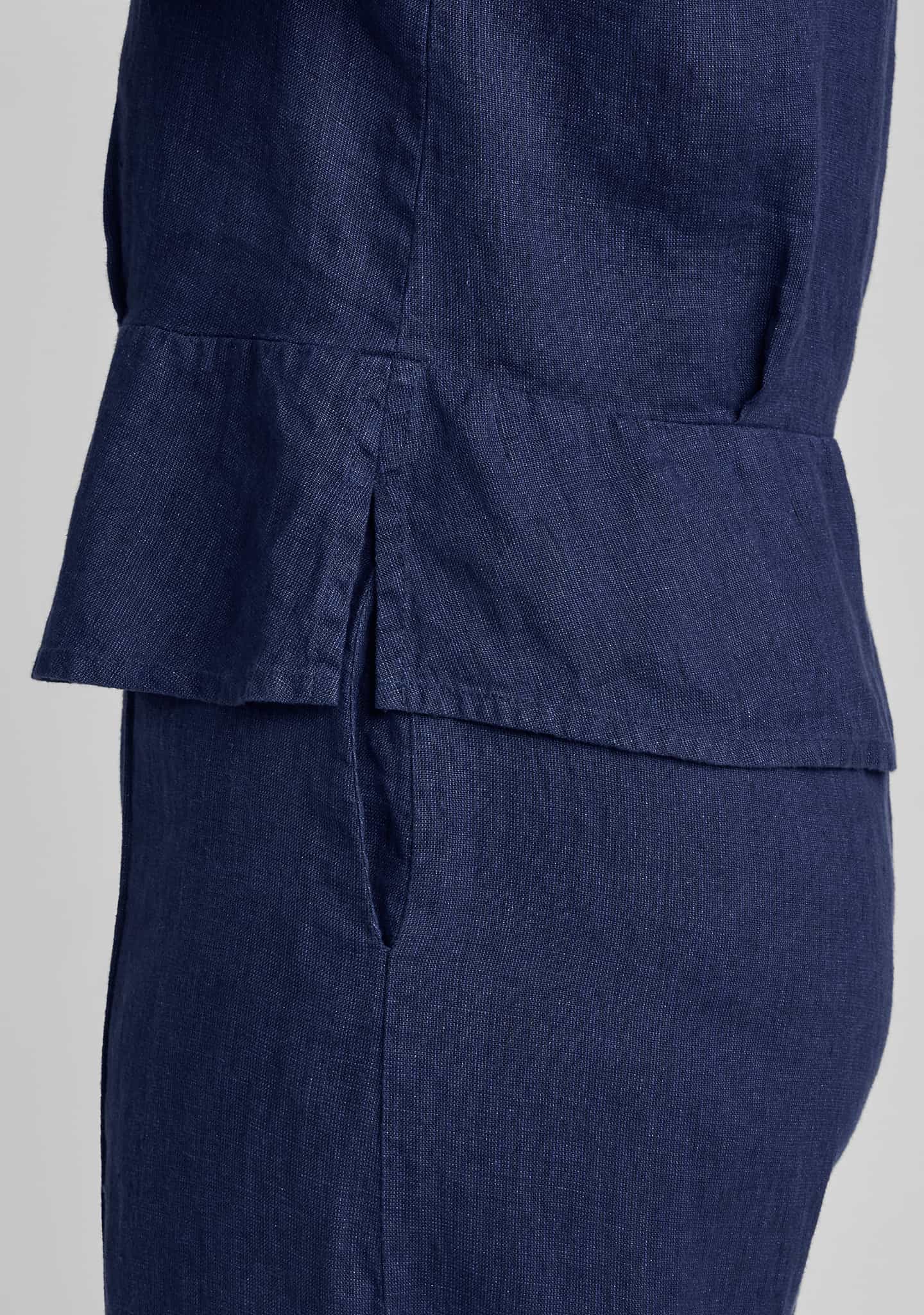 side view of peplum pullover in blue