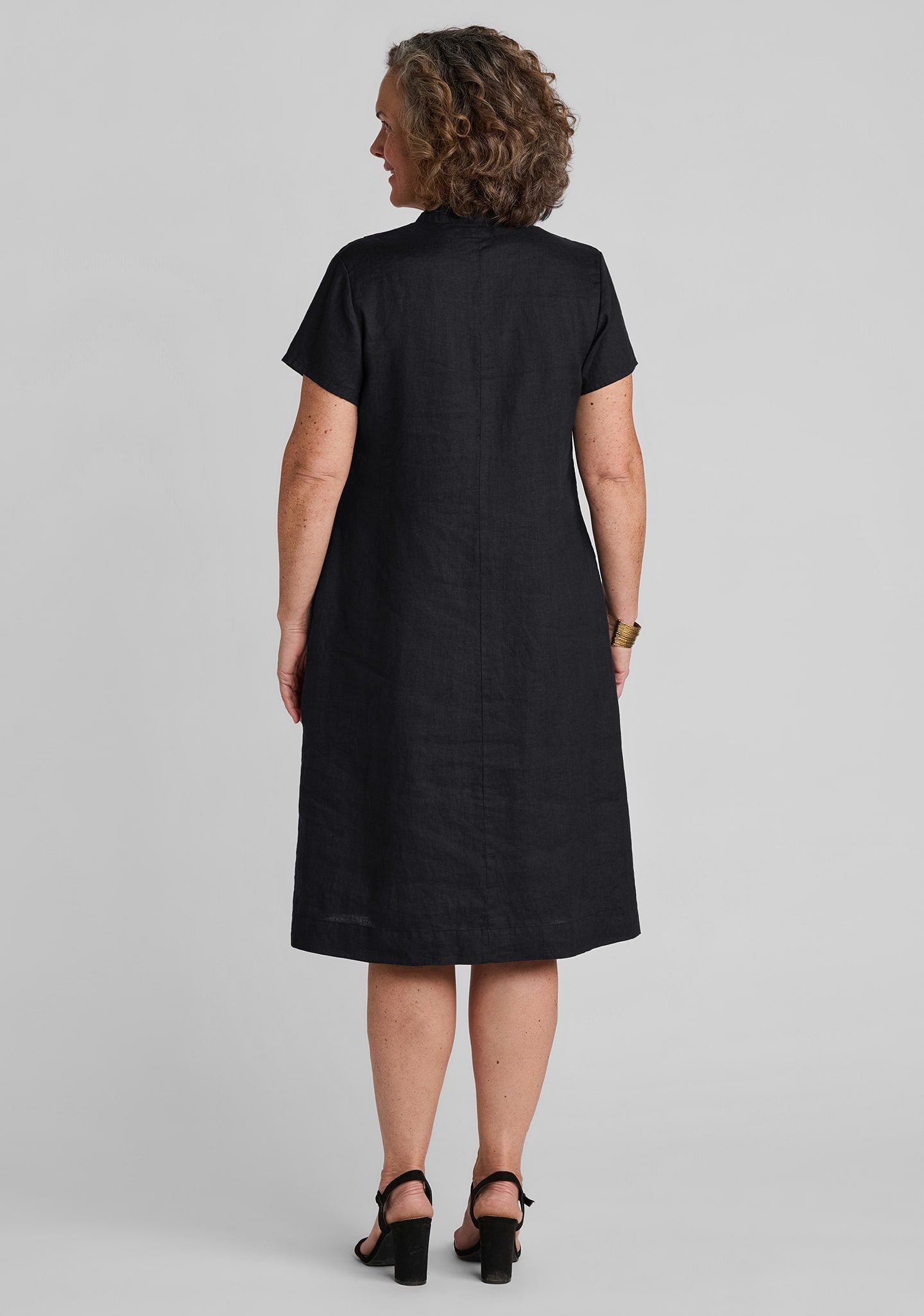 back view of women's black linen dress