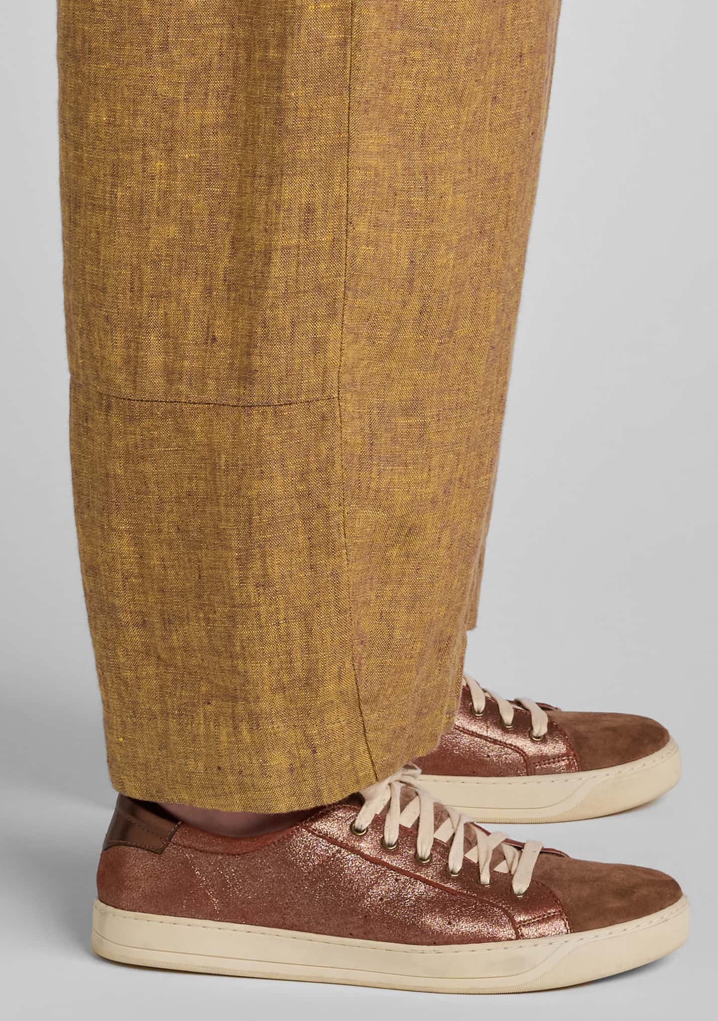 close up of hem on linen pants showcasing seem details