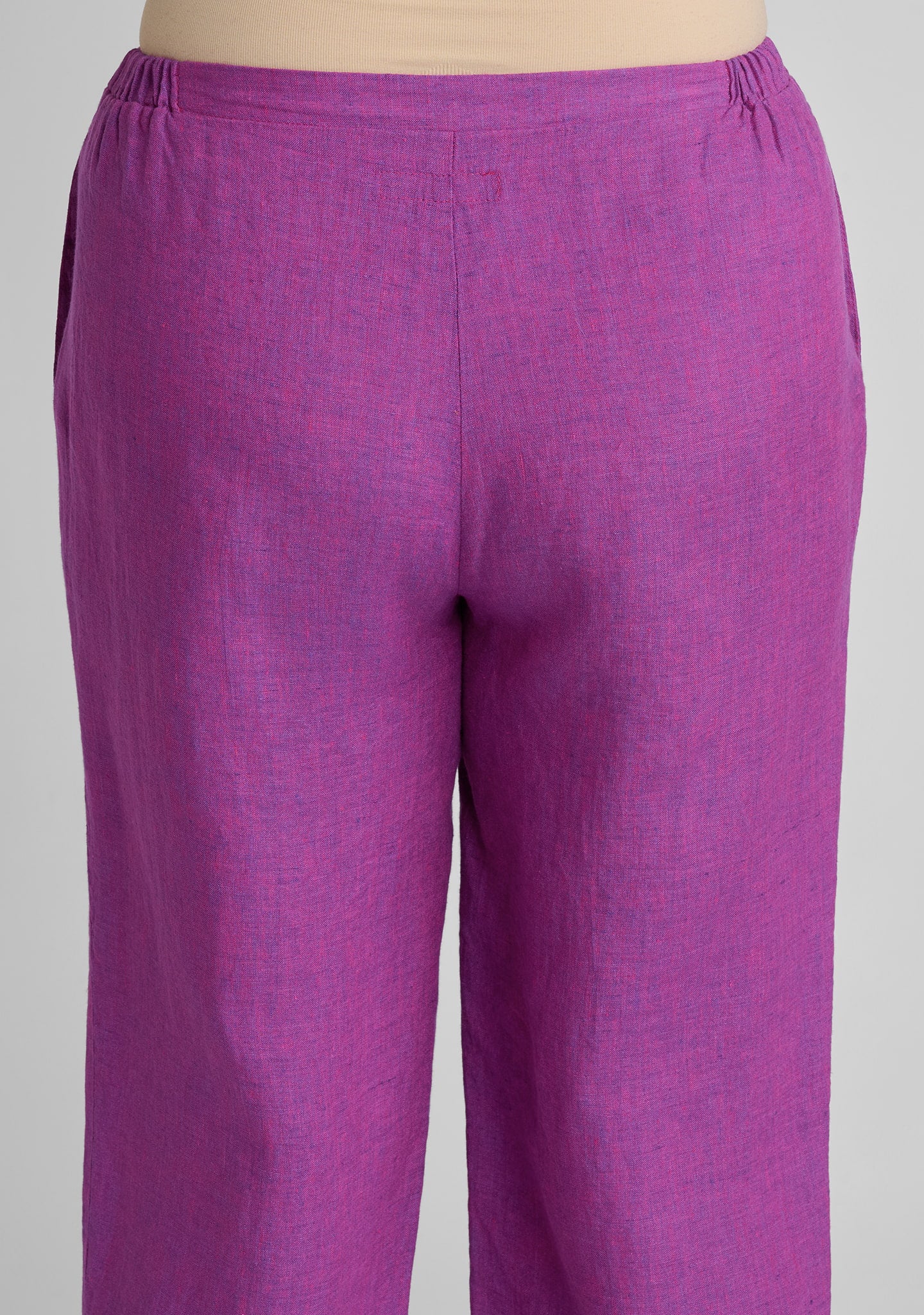 back view of women's linen pants in purple