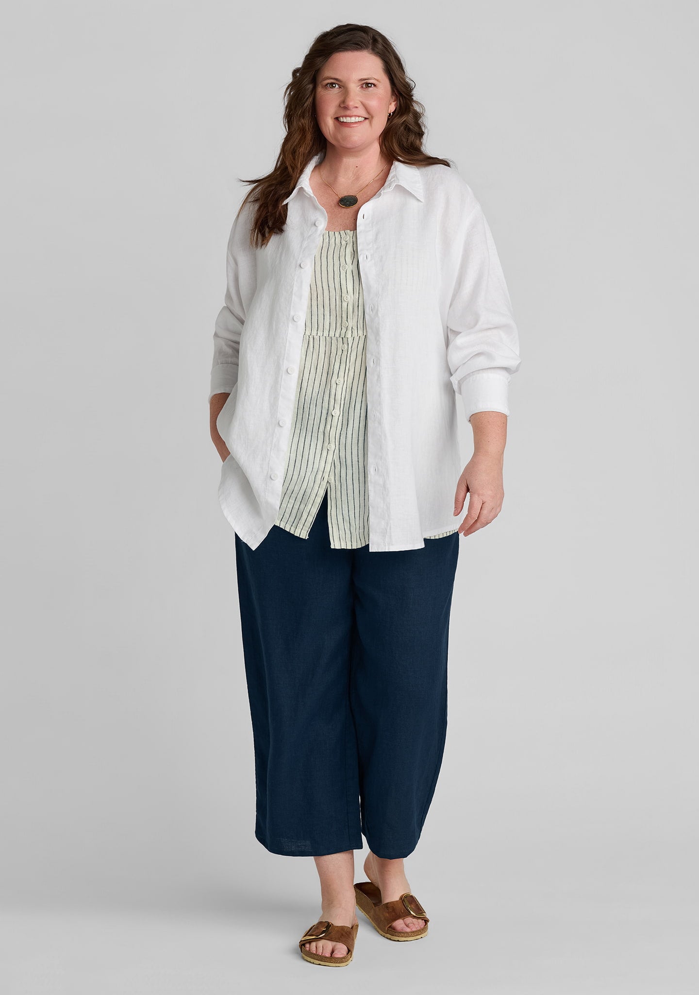 FLAX linen button down in white with yellow linen tank top and blue linen pants