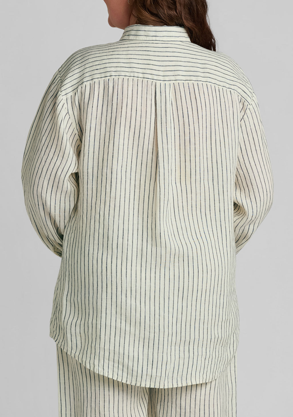 back view of striped button down shirt 