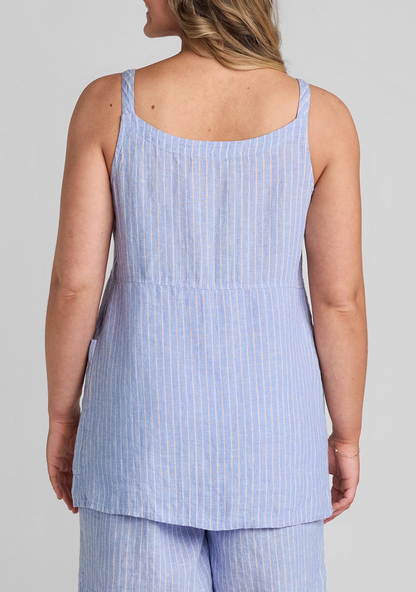back view of blue linen sleeveless shirt