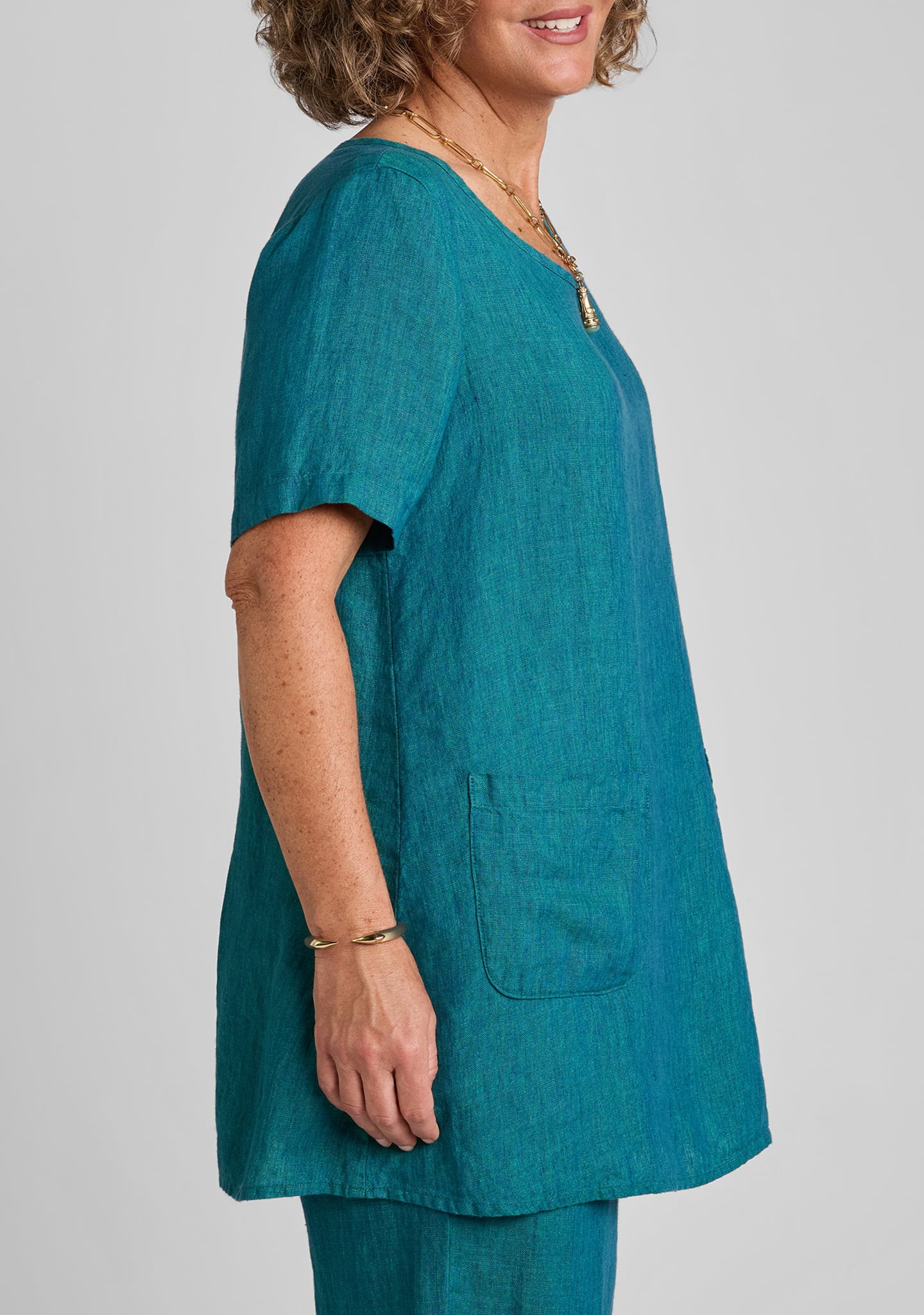 side view of green linen t shirt