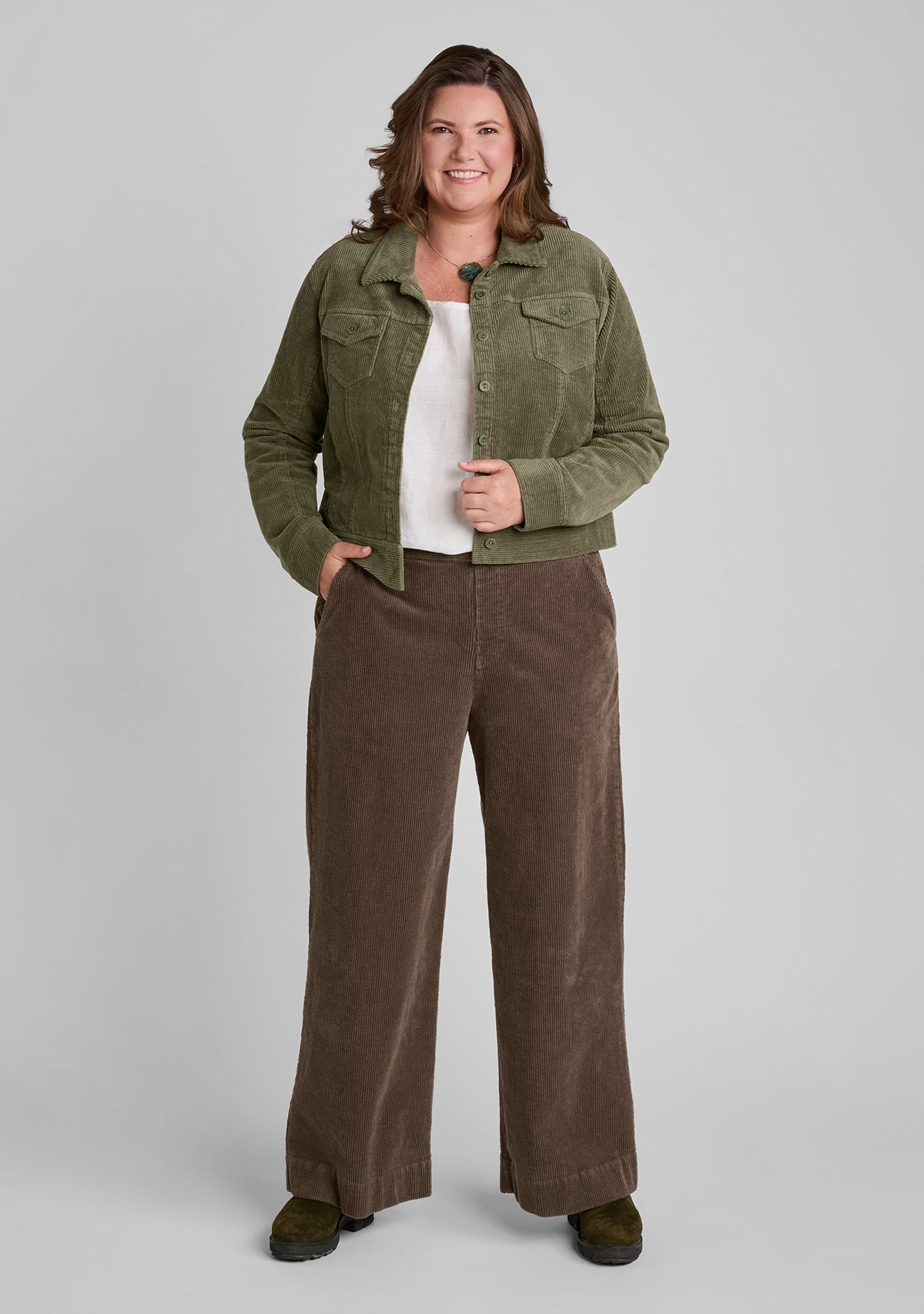 cotton blend corduroy jacket in green with linen tank top in white and corduroy pants in brown