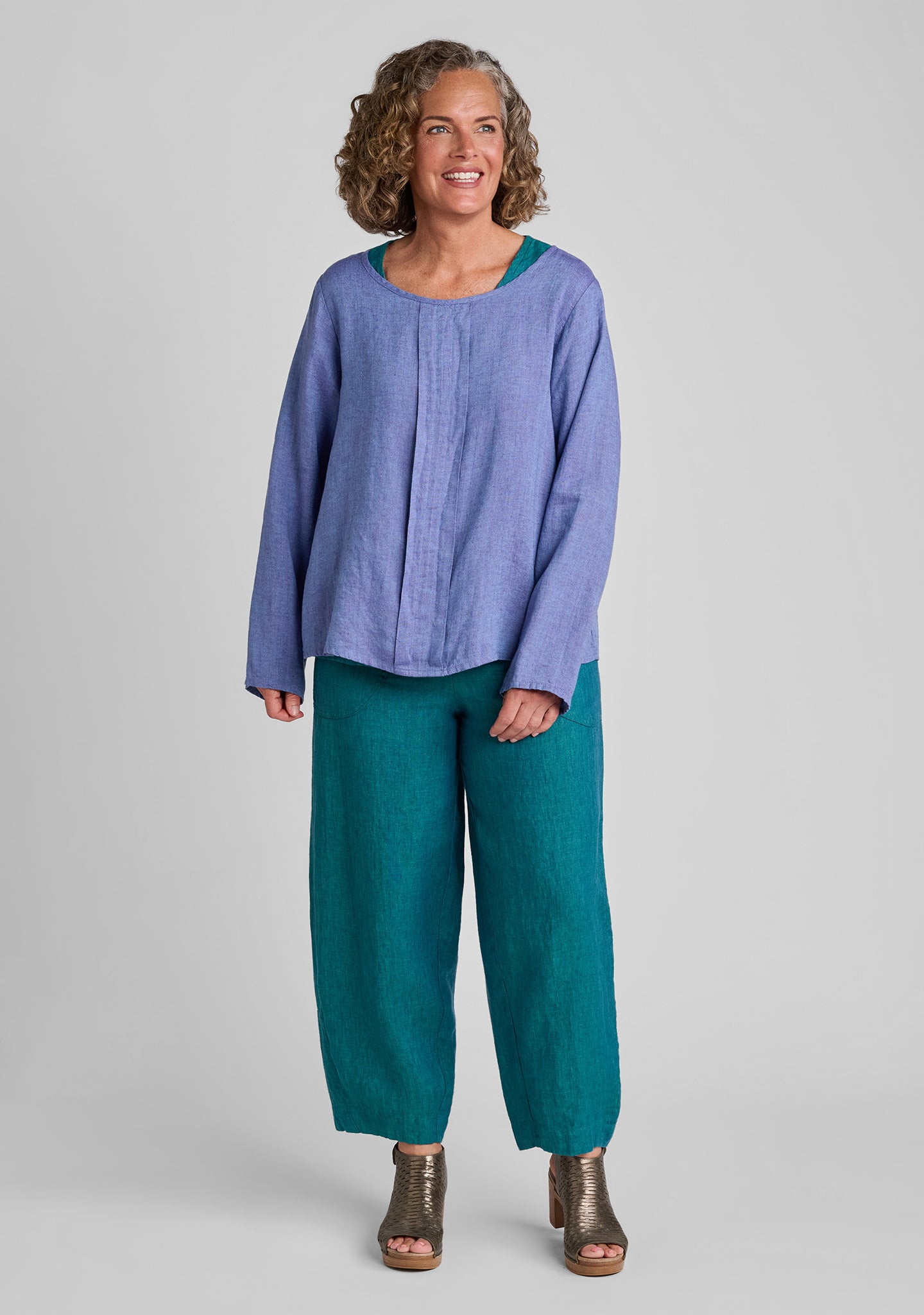 FLAX linen pullover in purple with linen tank top in green and linen pants in green
