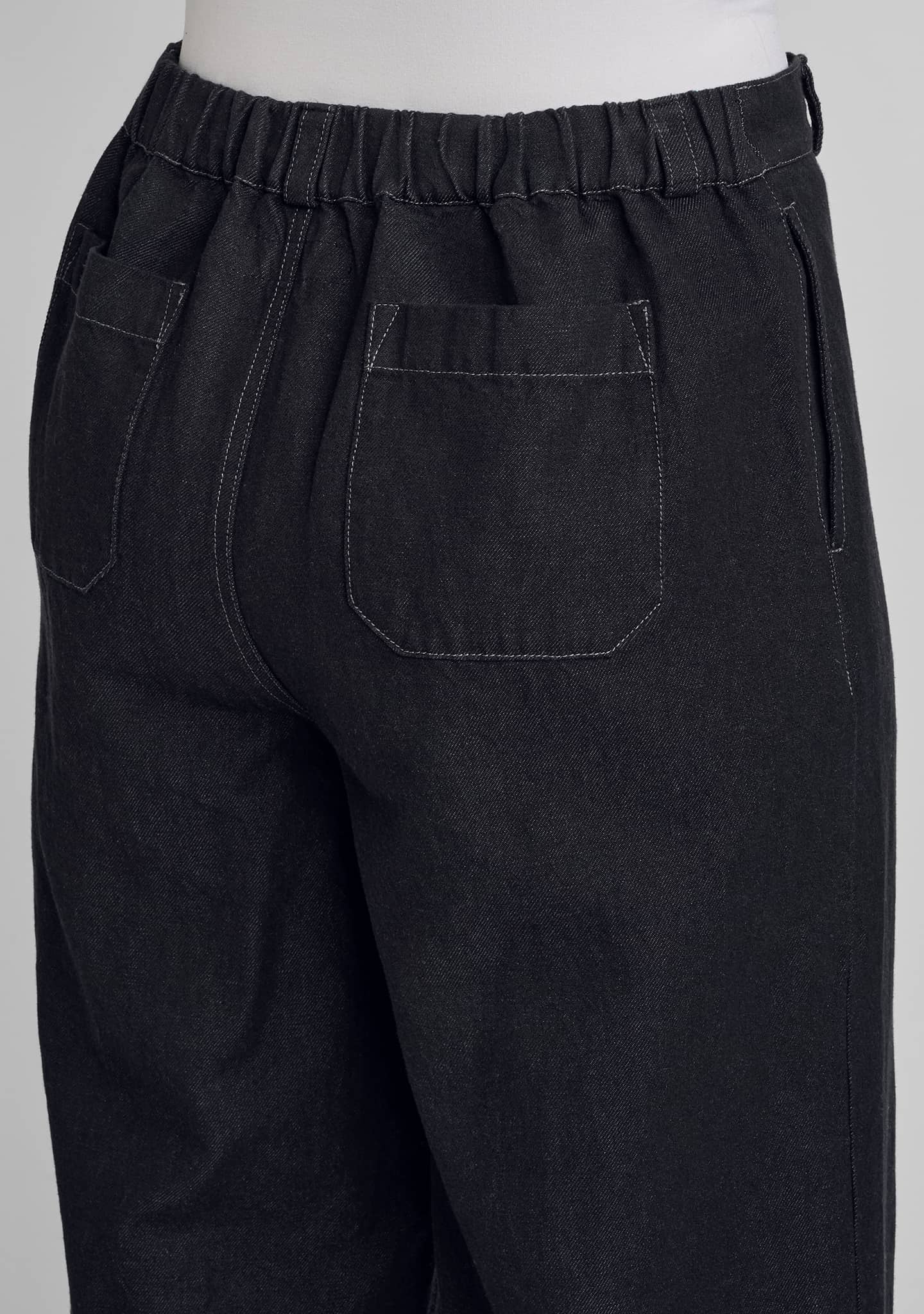 close up view of two pack pockets and waistband